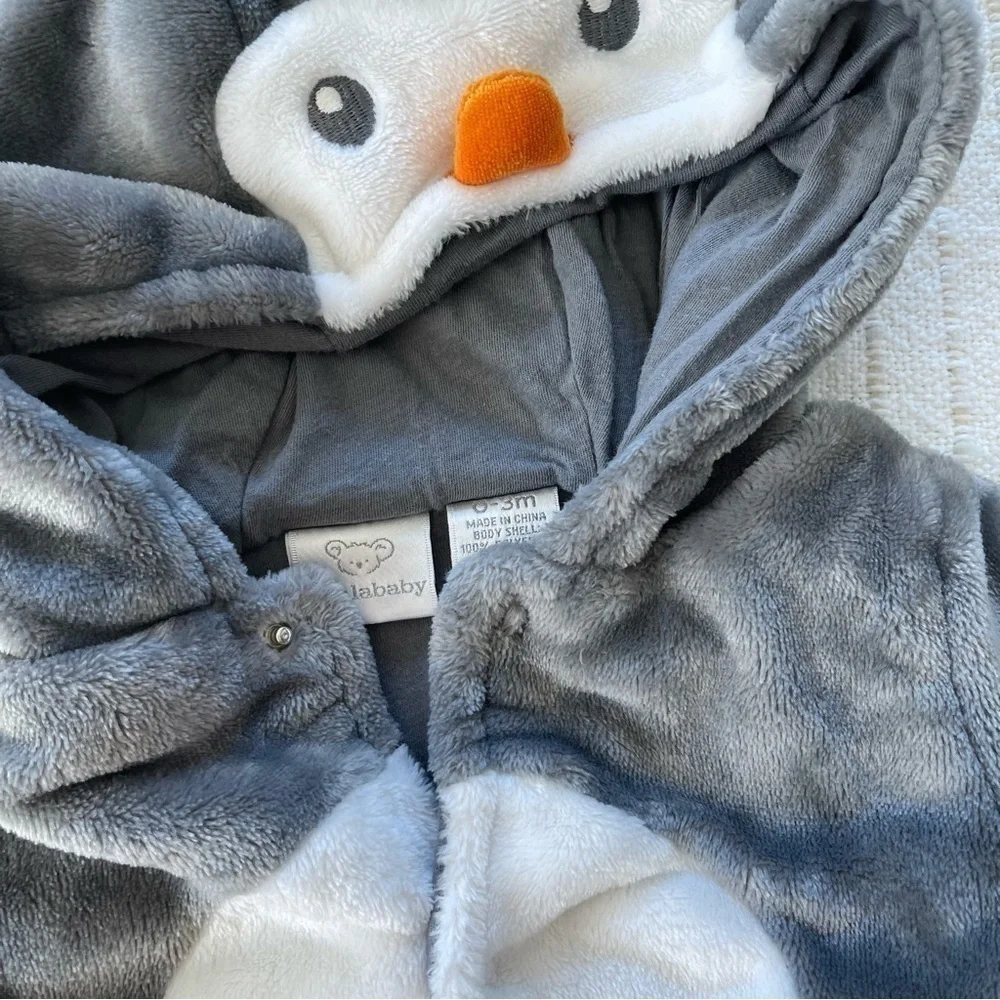 Bundle of two baby winter snowsuits, novelty penguin and neutral navy size 0-3